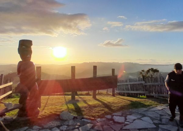 Morning ceremony to welcome the day and a blessing for Te Tohu (new sign)